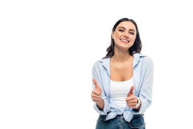 excited woman in blue shirt showing thumbs up isolated on white clipart