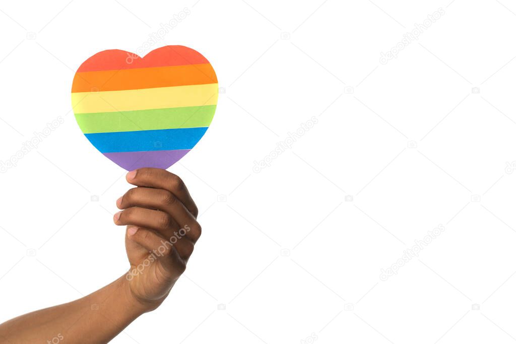 hand of african american holding rainbow colors paper heart isolated on white
