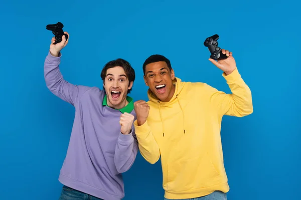 Kyiv Ukraine March 2021 Smiling Interracial Hipsters Holding Joysticks Hands — Stock Photo, Image