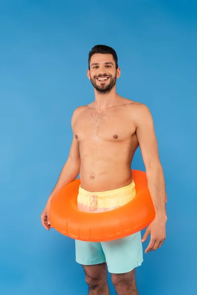 Smiling Shirtless Man Inflatable Ring Looking Camera Isolated Blue — Stock Photo, Image