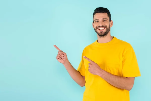Smiling Man Pointing Fingers Isolated Blue — Stock Photo, Image