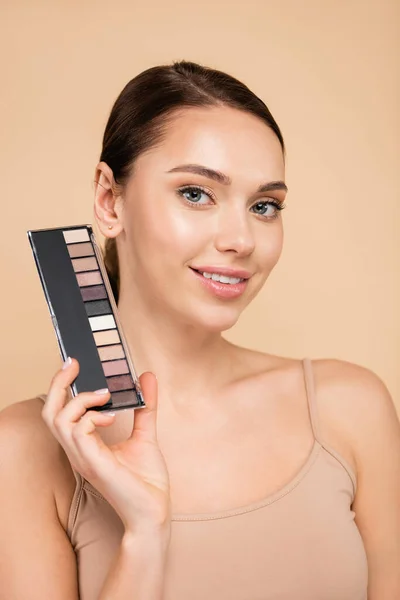 Pleased Woman Eye Shadows Palette Smiling Camera Isolated Beige — Stock Photo, Image