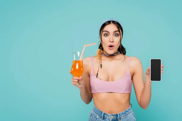 Excited Woman Holding Cocktail Smartphone Isolated Blue — Stock Photo, Image