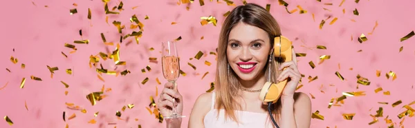 Smiling Woman Holding Champagne Talking Telephone Confetti Pink Background Banner — Stock Photo, Image