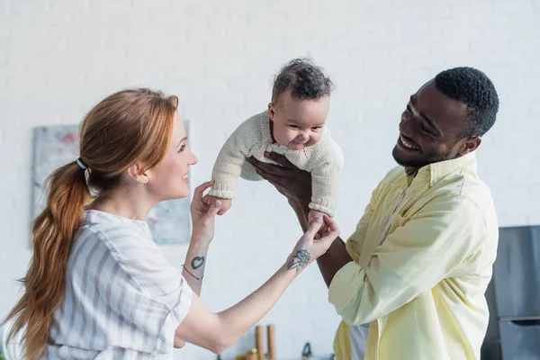 Happy Multicultural Couple Having Fun Baby Girl Home — Stock Photo, Image