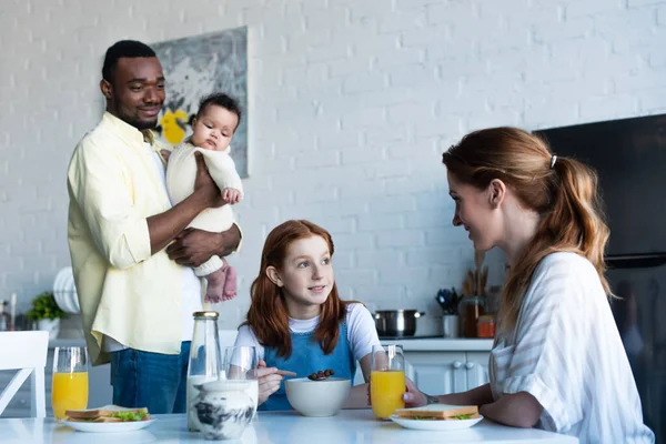 African American Man Holding Infant Wife Daughter Having Breakfast Kitchen — Stock Photo, Image