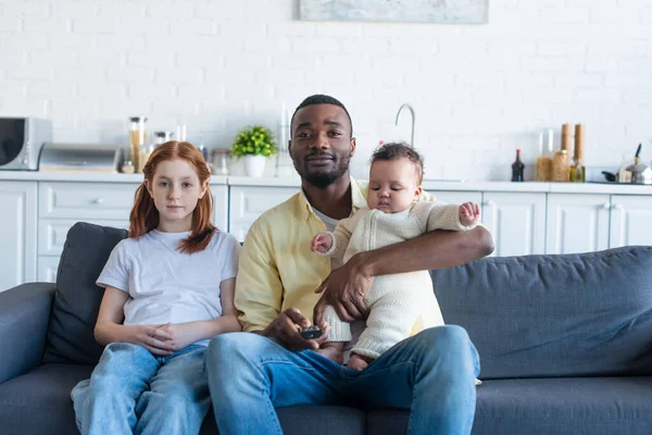 Happy African American Man Holding Infant Baby While Watching Preteen — Stock Photo, Image