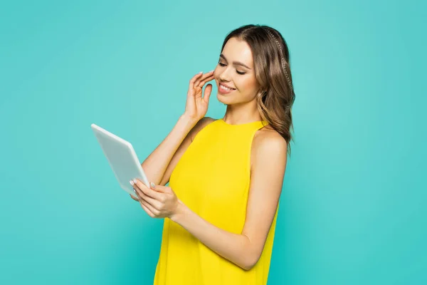 Positive Woman Yellow Dress Holding Digital Tablet Isolated Blue — Stock Photo, Image