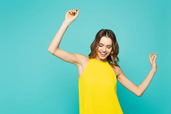 Cheerful Woman Yellow Dress Dancing Isolated Blue — Stock Photo, Image