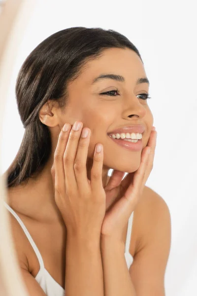 Positive Young African American Woman Looking Mirror Hands Face White — Stock Photo, Image