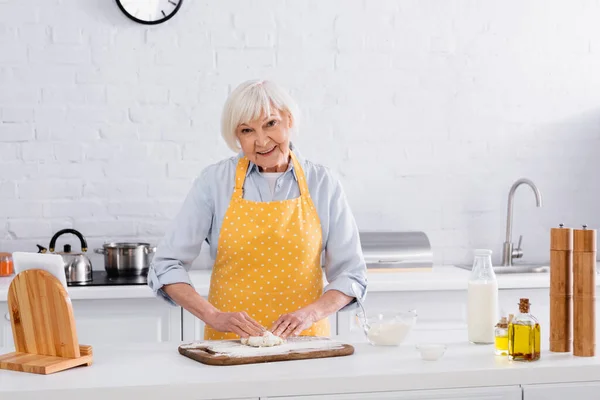 Cheerful Senior Woman Looking Camera Dough Digital Tablet Home — Stock Photo, Image