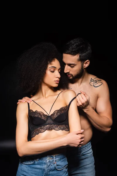Tattooed Man Taking Bra African American Girlfriend Black Background — Stock Photo, Image