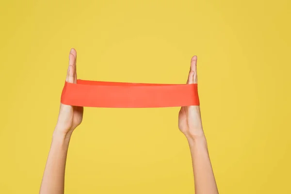 Cropped View Woman Working Out Resistance Band Isolated Yellow — Foto de Stock