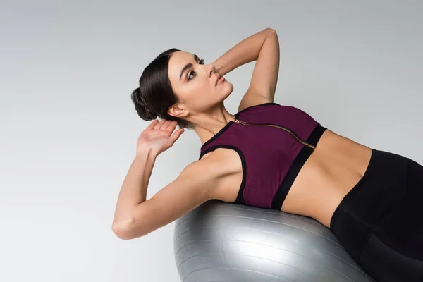 Young Woman Training Fitness Ball Grey Background — Foto de Stock