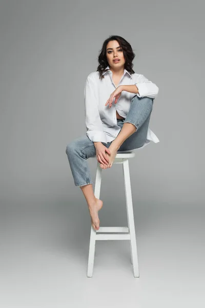 Smiling Barefoot Woman Sitting Chair Grey Background — Stock Photo, Image