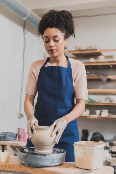 Serious Young African American Woman Shaping Wet Clay Pot Wheel — Stock Photo, Image