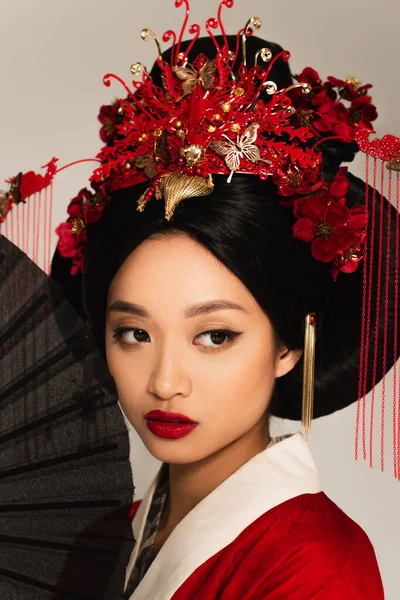 Asian Woman National Hairstyle Looking Away Fan Isolated Grey — Stock Photo, Image