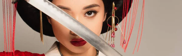 Asian Woman Covering Face Blade Sword Isolated Grey Banner — Stock Photo, Image