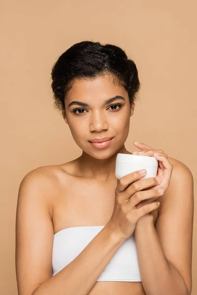 Young African American Woman Bare Shoulders Holding Container Cosmetic Cream — Stock Photo, Image