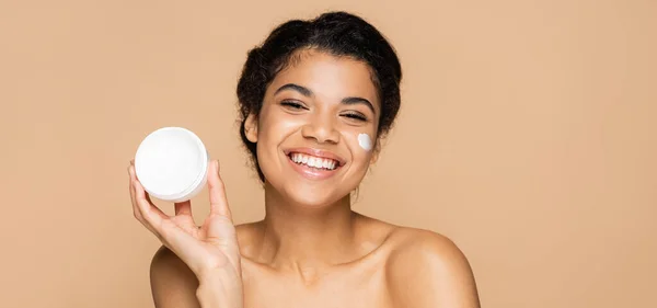 Smiling African American Woman Bare Shoulders Holding Container Cosmetic Cream — Stock Photo, Image