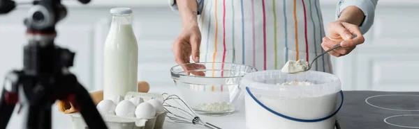 Partial View Woman Apron Holding Spoon Flour Blurred Digital Camera — Stock Photo, Image