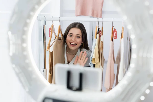 Blurred Phone Holder Circle Light Excited Fashion Blogger Waving Hand — Stock Photo, Image