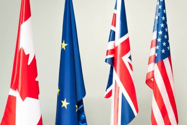 flags of usa, canada, great britain and european union isolated on grey clipart