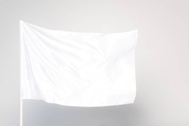 white satin flag isolated on grey clipart