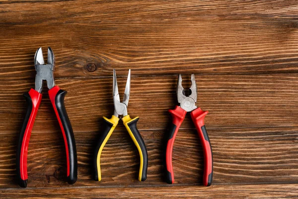 Top View Pliers Wire Cutters Wooden Surface Labor Day Concept — Stock Photo, Image