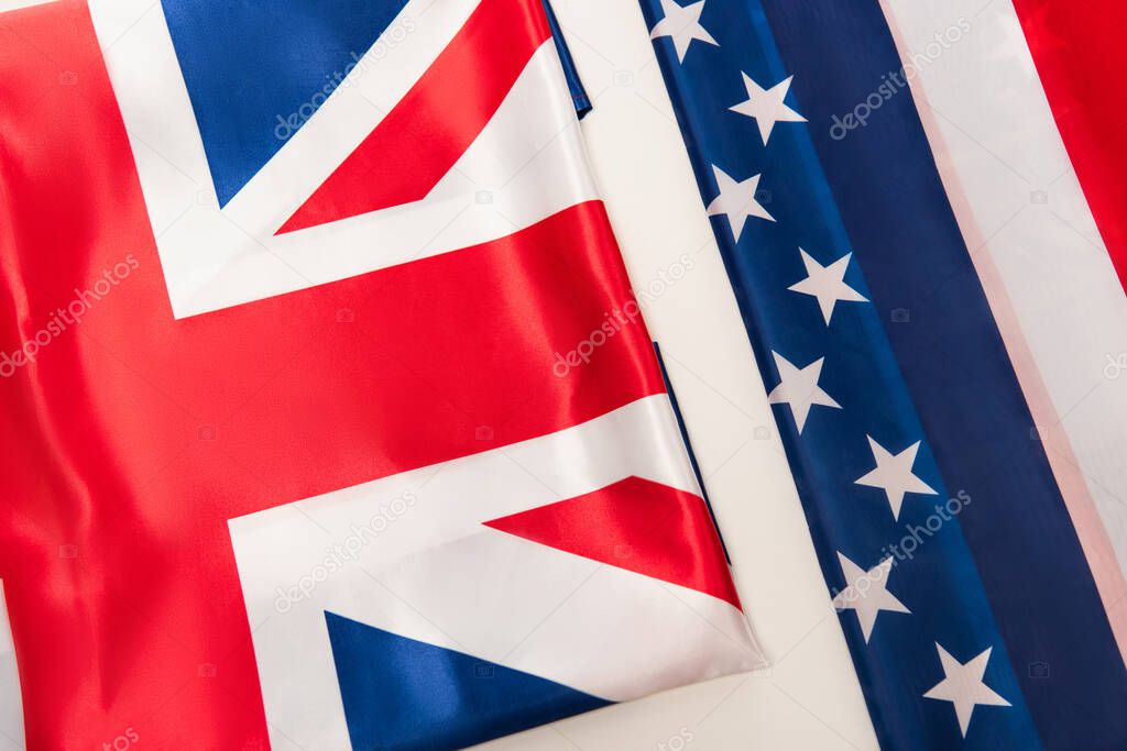 top view of national british and american flags isolated on white