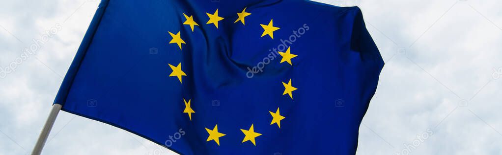 low angle view of blue european union flag against sky, banner