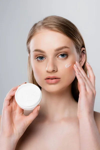 Pretty Woman Blue Eyes Applying Cream Face Isolated Grey — Stock Photo, Image