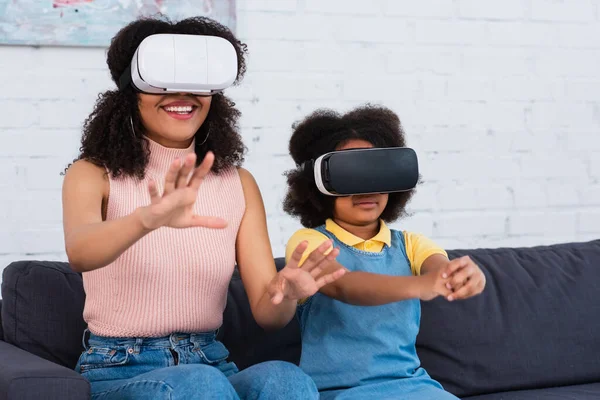 Smiling African American Mother Using Headset Daughter Living Room — Stock Photo, Image