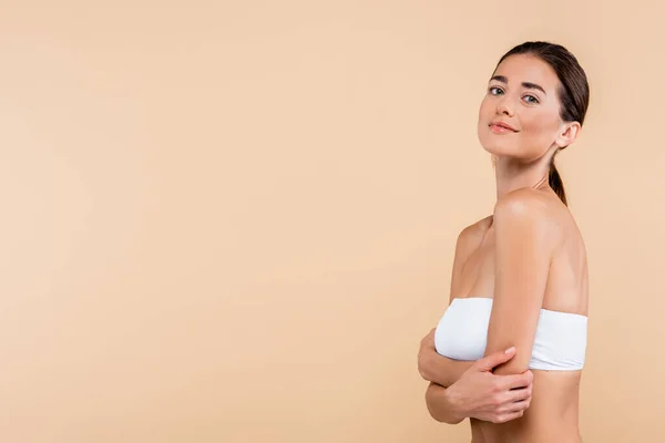 Brunette Woman Strapless Top Posing Crossed Arms Isolated Beige Beauty — Fotografia de Stock