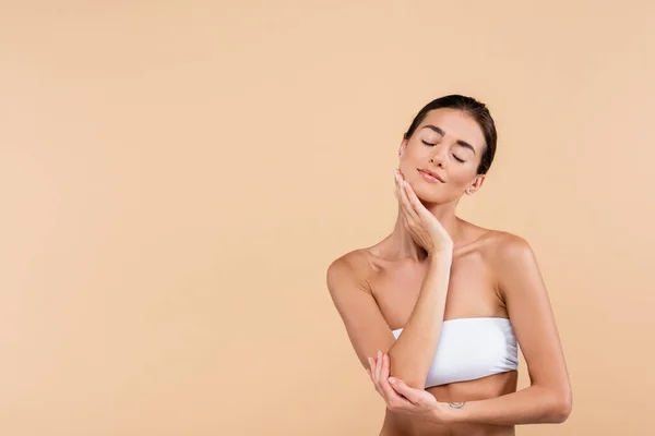 Young Woman White Strapless Top Posing Closed Eyes Isolated Beige — Fotografia de Stock