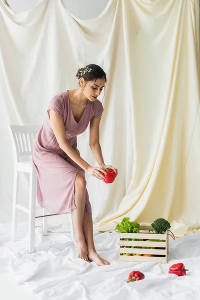 Brunette Woman Holding Red Bell Pepper Vegetables Wooden Container White — Stock Photo, Image