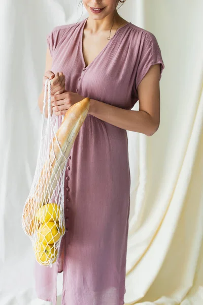 Cropped View Happy Woman Holding Reusable String Bag Lemons Baguette — Stock Photo, Image