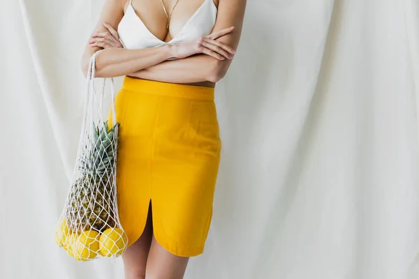 Cropped View Woman Yellow Skirt Crop Top Holding String Bag — Stock Photo, Image