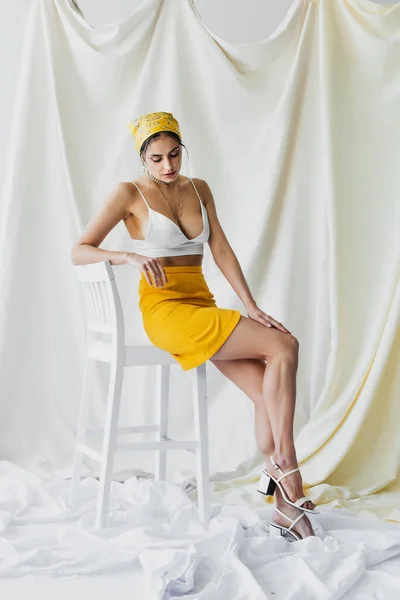 Full Length Stylish Woman Yellow Headscarf Skirt Crop Top Sitting — 图库照片