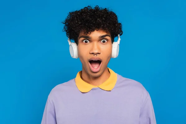 Thrilled African American Man Wireless Headphones Looking Camera Isolated Blue — Foto de Stock