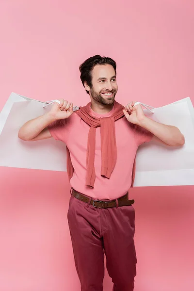 Sonriente Adicta Las Compras Sosteniendo Bolsas Aisladas Rosa — Foto de Stock