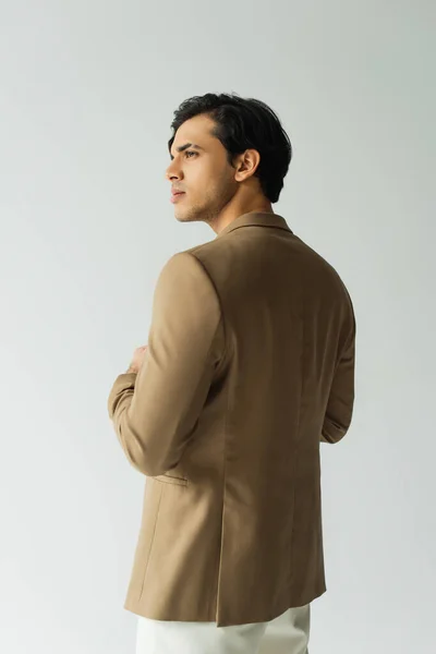 Young Man Beige Blazer Looking Away Posing Isolated Grey — Stock Photo, Image