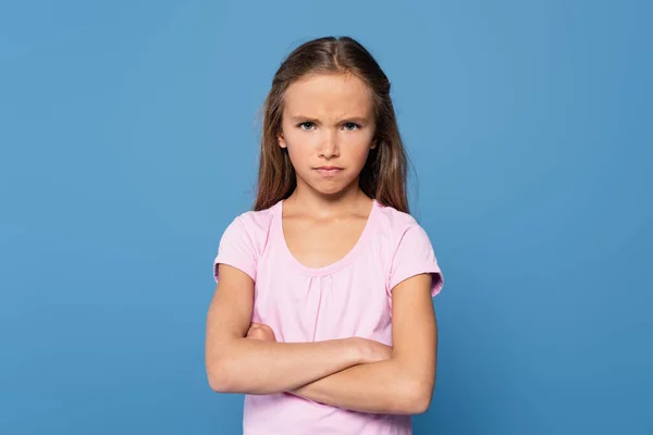 Offended Girl Crossed Arms Looking Camera Isolated Blue — Stock Photo, Image