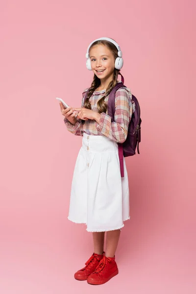 Preteen Schoolkid Headphones Holding Smartphone Pink Background — Foto de Stock