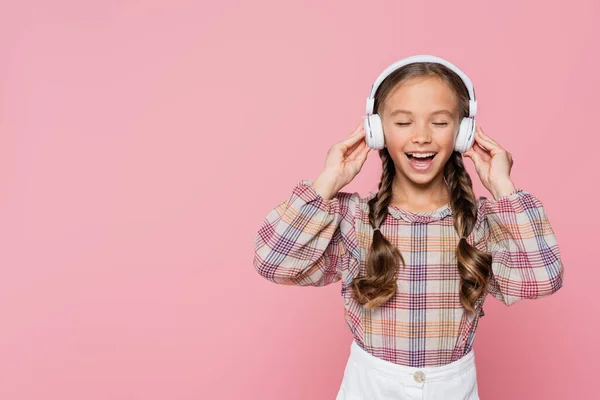 Happy Kid Listening Music Headphones Closed Eyes Isolated Pink — Stock Photo, Image