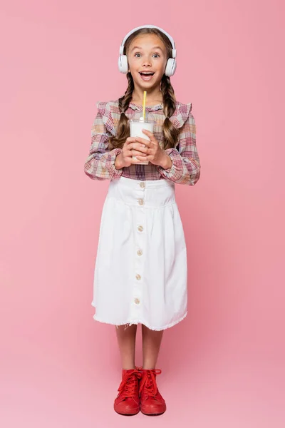 Smiling Child Headphones Holding Milkshake Pink Background — Stock Photo, Image