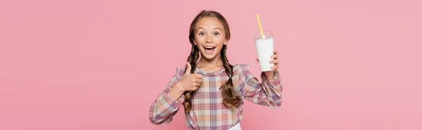 Cheerful Kid Showing Gesture Holding Milkshake Isolated Pink Banner — Foto de Stock