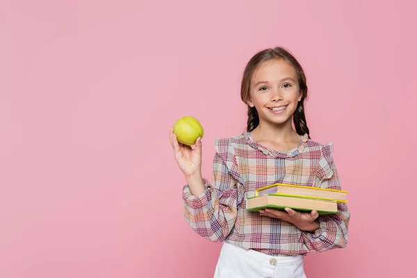 Pleased Girl Green Apple Textbooks Smiling Camera Isolated Pink — Stock Photo, Image