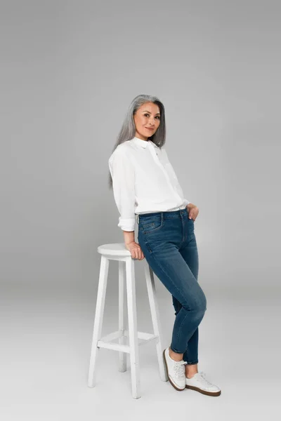 Stylish Asian Woman White Shirt Standing Hand Pocket Jeans High — Stock Photo, Image