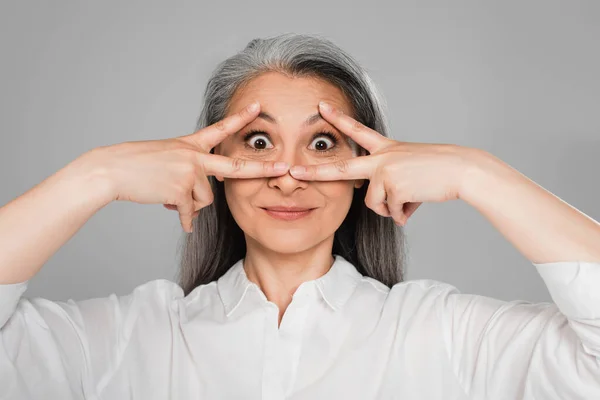 Excited Asian Woman Showing Victory Signs Eyes Isolated Grey — Stock Photo, Image